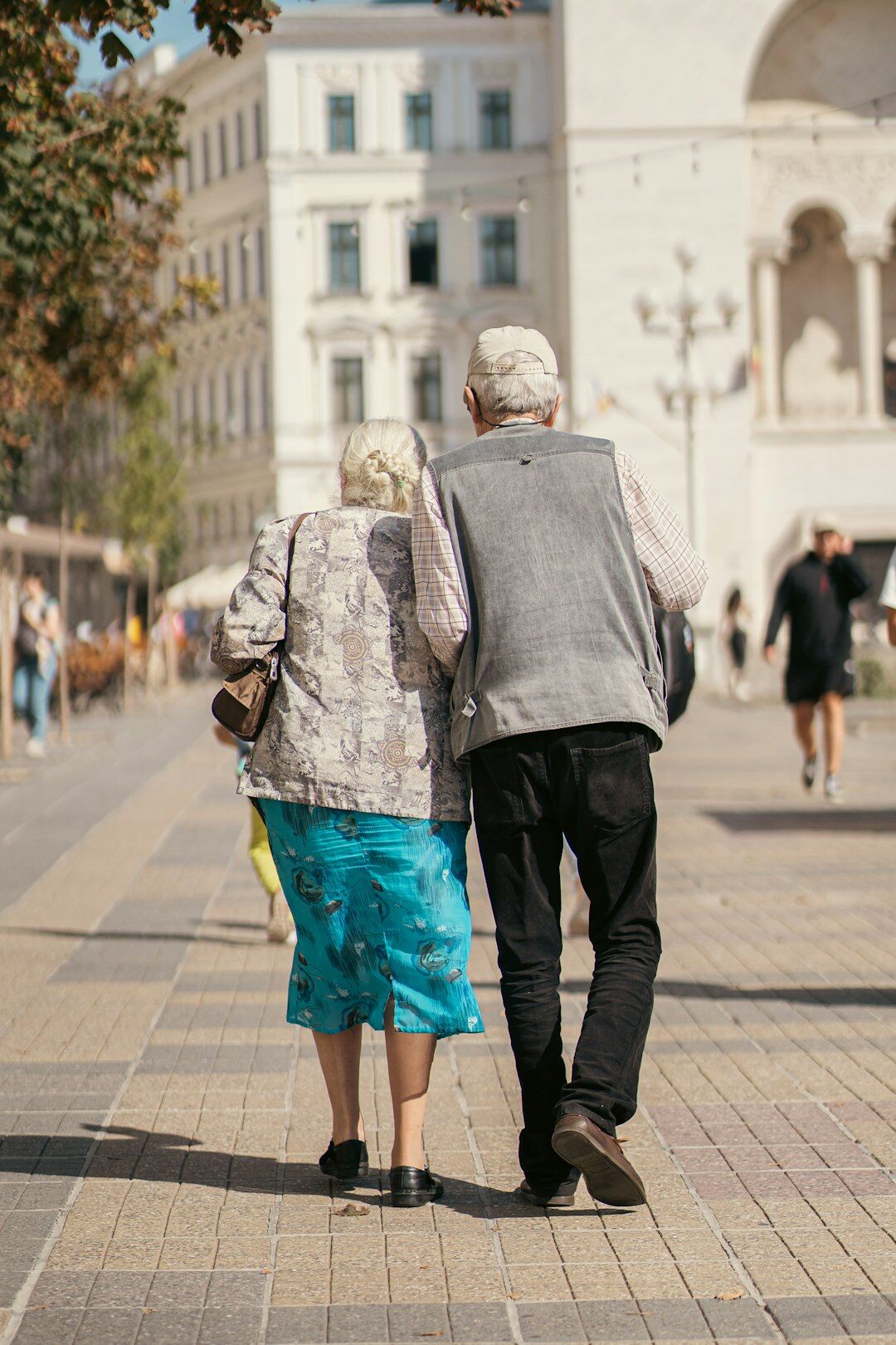 happy senior couple walking