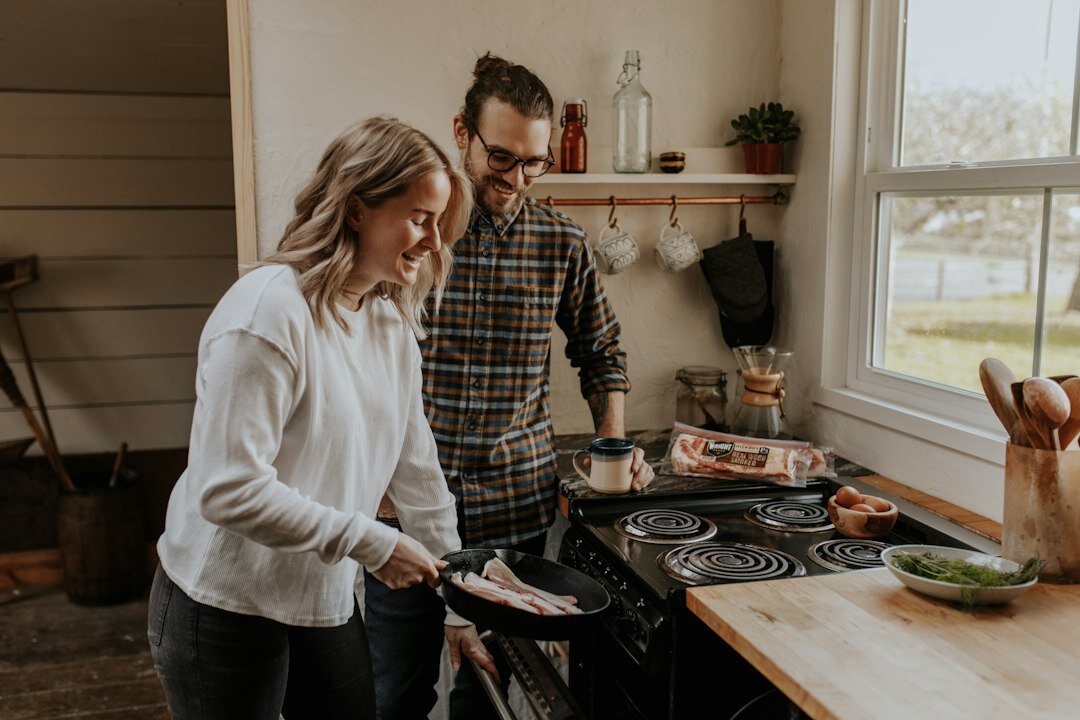 senior couple cooking healthy meal