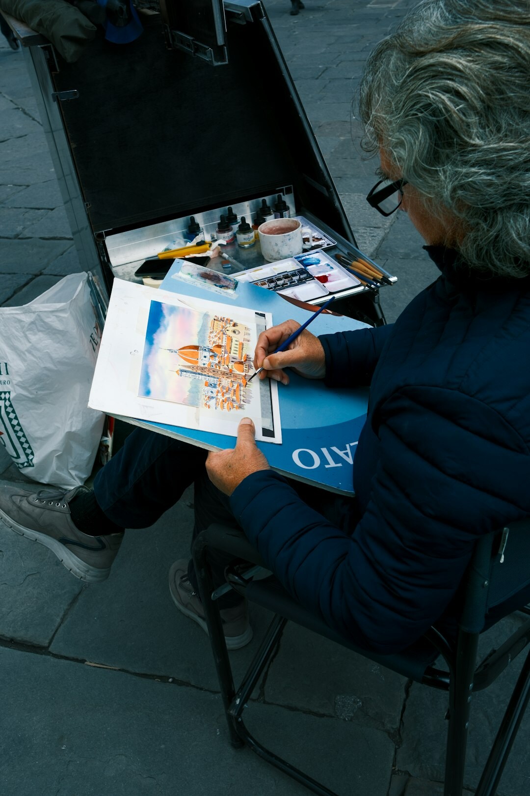 elderly person painting